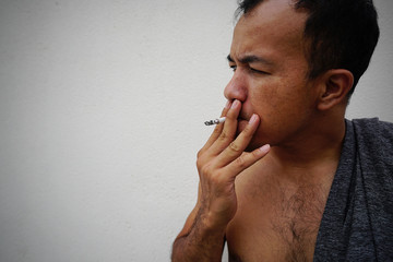 Man smokes a cigarette