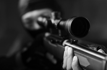 Close up men's commando who is holding guns