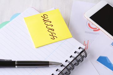 Close up of business stuff with technology devices and  sticky paper with 