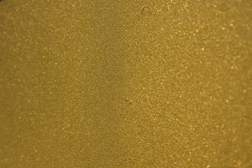 Shiny yellow leaf gold painted blur texture background