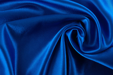 Abstract silk luxury background, piece of cloth, deep blue cloth texture
