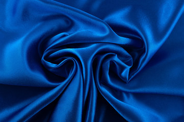 Obraz premium Abstract silk luxury background, piece of cloth, deep blue cloth texture