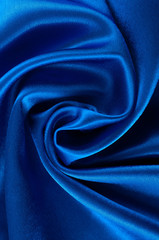 Fototapeta premium Abstract silk luxury background, piece of cloth, deep blue cloth texture