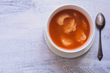 Bowl of fresh tomato soup whit noodles/ Vegetarian diet food