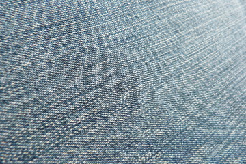 blue denim fabric close-up of gin natural material for clothing cotton rough linen background for...
