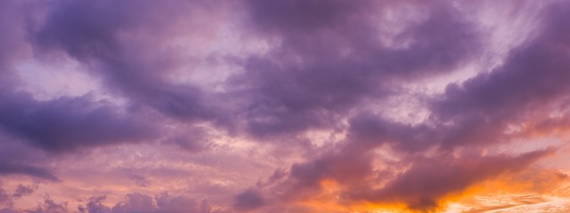 Fototapeta na wymiar Panorama view of dramatic beautiful nature sunset sky and clouds background