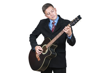 Businessman in suit playing acoustic on guitar, isolated on white background