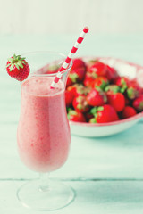 strawberry milk shake on wooden surface