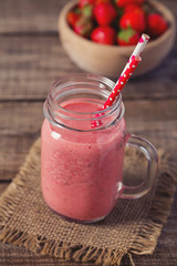 strawberry milk shake on wooden surface