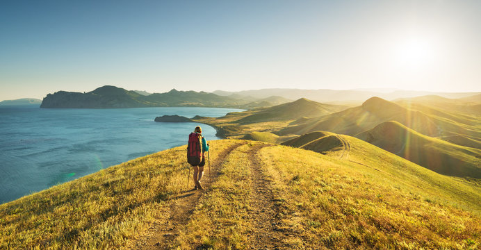 Girl Hiker Are Goes Along The Route