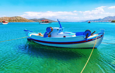 Naklejka na ściany i meble Fishing boat off the coast of Crete, Greece