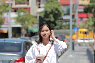 A woman walking on the street in Thanh Hoa, Vietnam