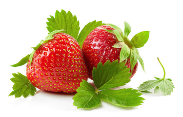 fresh red strawberries with green leaves