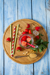 strawberry lemonade on wooden surface