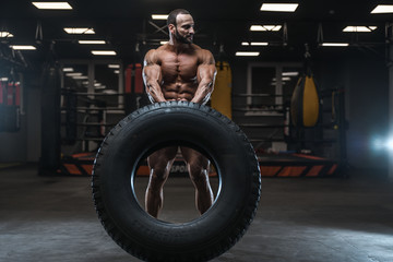 Brutal strong bodybuilder athletic men pumping up muscles with dumbbells