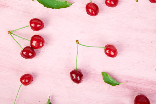 Ripe cherry berries and cherry  leaf