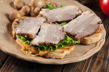 Sandwich with baked pork belly