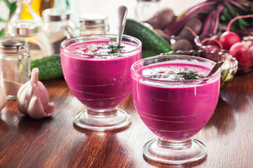Cold beet soup with egg, cucumber and greens