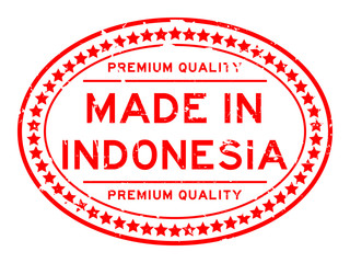 Grunge red premium quality made in Indonesia oval rubber seal stamp on white background