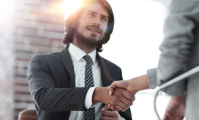 Successful job interview with boss and employee handshaking