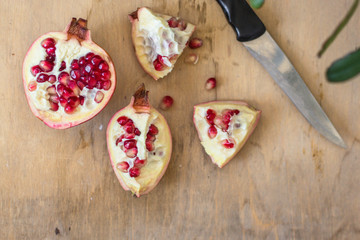 pomegranate - tasty and ripe red grain (harvest). food background