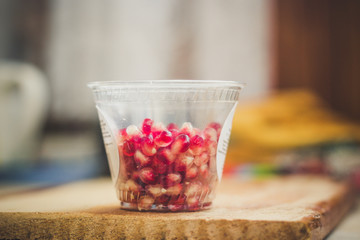 pomegranate - tasty and ripe red grain (harvest). food background