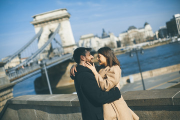 Couple in love hugging with magnificent view of Budapest, Hungary