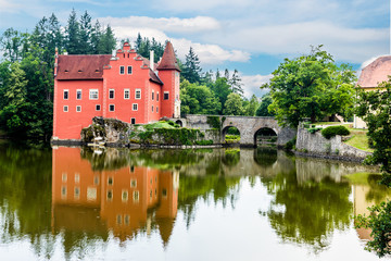 Fototapeta na wymiar The red, water chateau in the the Czech republic - Cervena Lhota