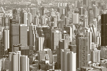 Black and white toned image of skyscrapers of Bangkok city
