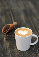 Hot coffee cafe latte on wood table
