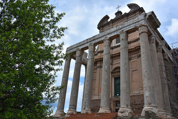 Fototapeta premium Rome, view and details of the archaeological area of the Roman Forums. Temple of Antoninus and Faustina.