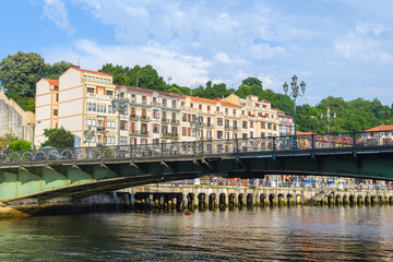 bilbao riverbank views on sunny day