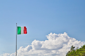 italian flag on cloudy background