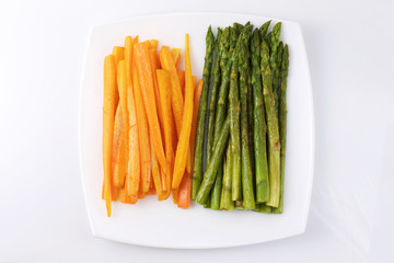 grilled asparagus with carrots on a plate