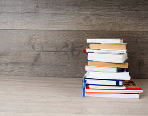The book is on a wooden table.
