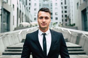 Fototapeta premium Confident success modern Business man on urban background