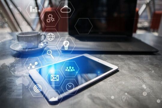 Business and technology concept. Graphs and icons on virtual screen.