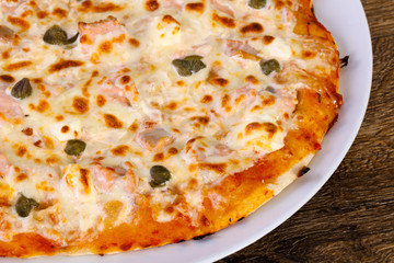 Pizza with salmon and capers