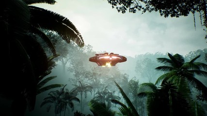 A spaceship flying over an unknown green planet. A futuristic concept of a UFO.
