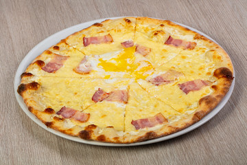 Pizza carbonara with bacon