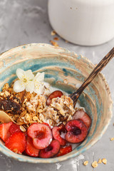 Homemade granola with yogurt and berries. Healthy food concept.