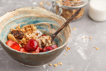 Homemade granola with yogurt and berries. Healthy food concept.