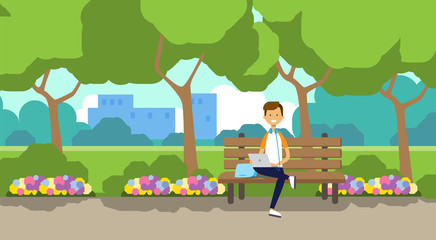 city park man holding laptop sitting wooden bench green lawn flowers trees cityscape template background flat vector illustration