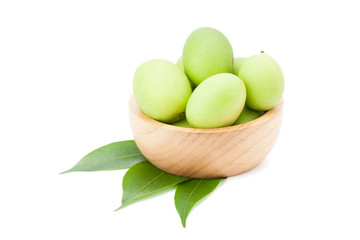 Plum Mango or Marian Plum fruits (Bouea macrophylla Griffith) in wooden bowl