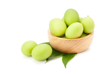 Plum Mango or Marian Plum fruits (Bouea macrophylla Griffith) in wooden bowl