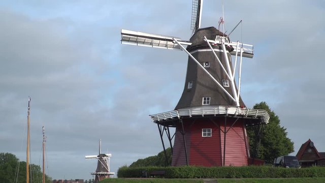 Windmill at a canal in Dokkum, Friesland, The Netherlands