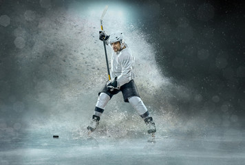 Obraz premium Caucasian ice hockey Players in dynamic action in a professional