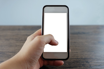 Hands of woman using smart phone at the office.