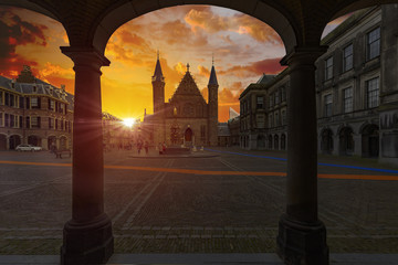 Sunrise on the Knight hall, Ridderzaal in Dutch, framed with arch ceiling of the alley around the...