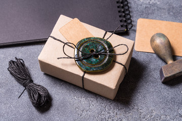 Gift box wrapping using button.